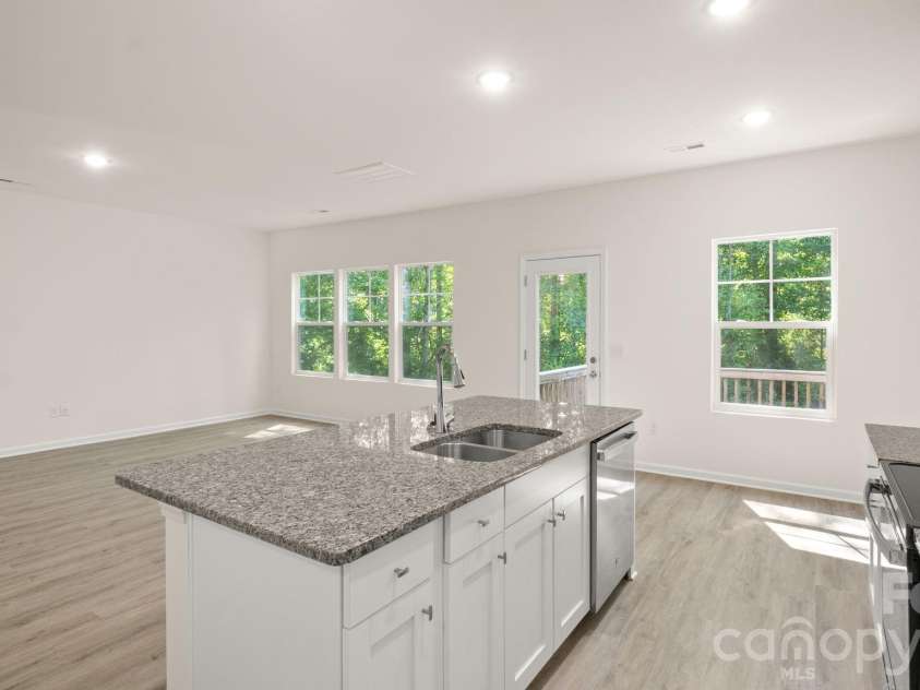 4029 Rolling Creek Drive, Vale, NC 28168.  MLS# CAR4390263, YatesRealty ID 41073. Kitchen to Living Area