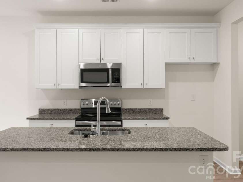 4029 Rolling Creek Drive, Vale, NC 28168.  MLS# CAR4390263, YatesRealty ID 41073. Kitchen with plenty of cabinets for storage