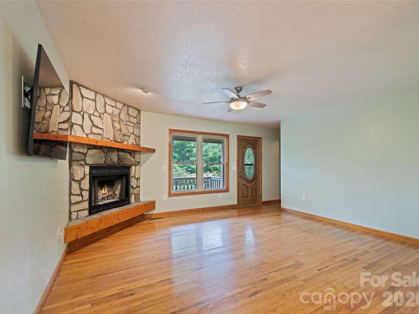 89 Cypress Lane, Canton, NC 28716.  MLS# CAR4399169, YatesRealty ID 41074. Wood burning fireplace