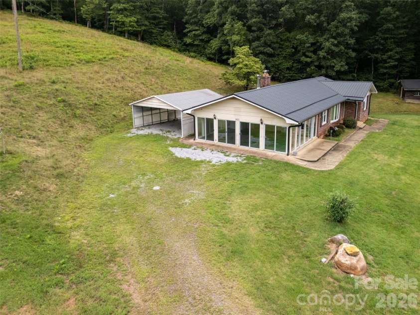 821 Tanasee Gap Road, Balsam Grove, NC 28708.  MLS# CAR4409086, YatesRealty ID 41076. 