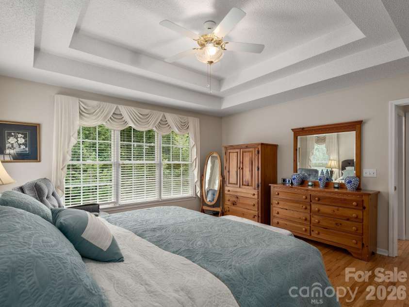 15 Winding Oak Drive, Arden, NC 28704.  MLS# CAR4405857, YatesRealty ID 41093. King size bed