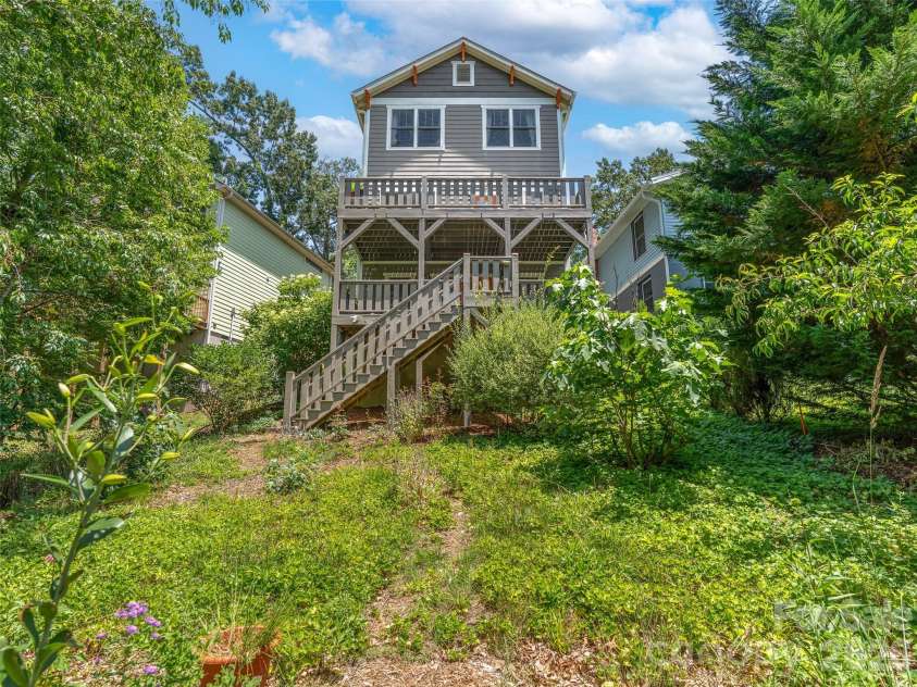 60 Mardell Circle, Asheville, NC 28806.  MLS# CAR4394403, YatesRealty ID 41095. Back view of home with ample backyard.