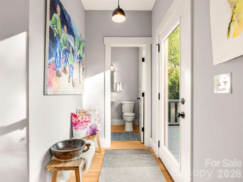 60 Mardell Circle, Asheville, NC 28806.  MLS# CAR4394403, YatesRealty ID 41095. Half bath located on main level just off deck.