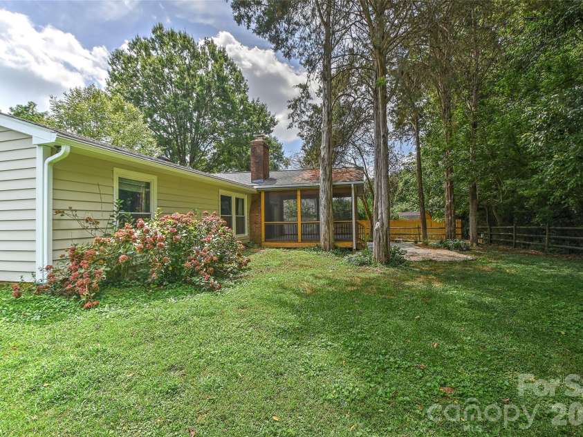 5900 Tillery Drive, Charlotte, NC 28226.  MLS# CAR4406670, YatesRealty ID 41096. Back yard side view