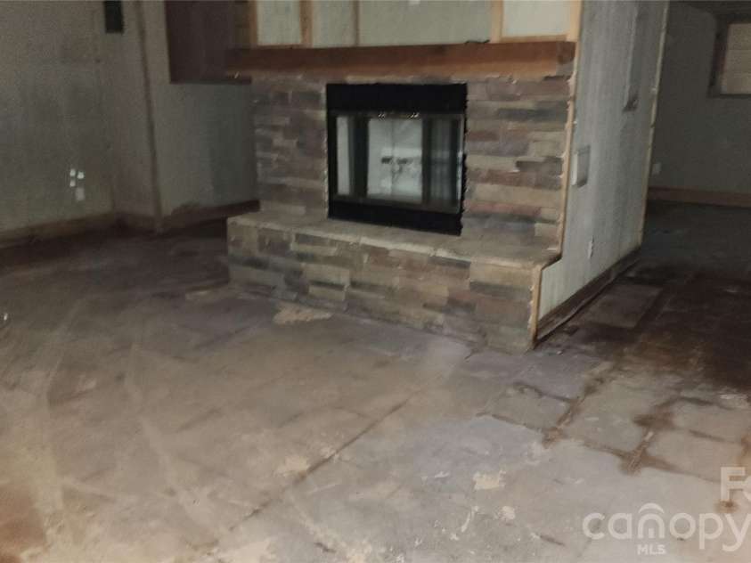 2020 Ada Williams Lane, Lenoir, NC 28645.  MLS# CAR4410237, YatesRealty ID 41102. Fireplace in basement