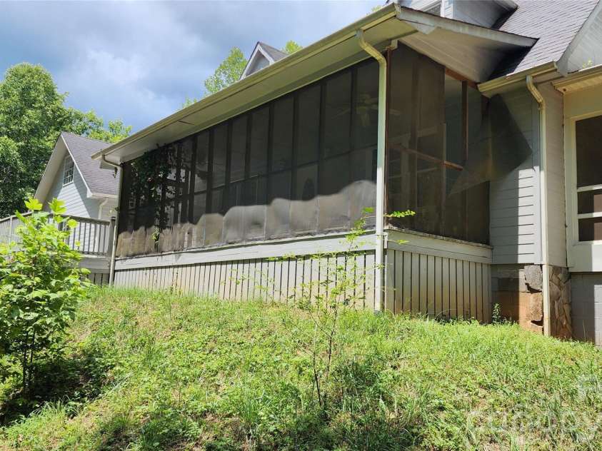2020 Ada Williams Lane, Lenoir, NC 28645.  MLS# CAR4410237, YatesRealty ID 41102. Screened in Porch on side