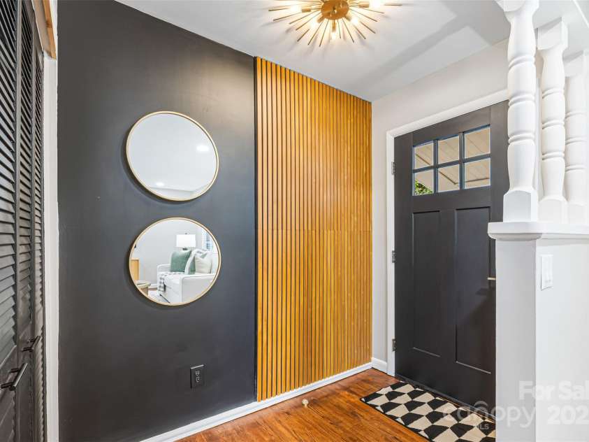 4308 Firwood Lane, Charlotte, NC 28209.  MLS# CAR4309666, YatesRealty ID 41102. Front entrance with a coat closet