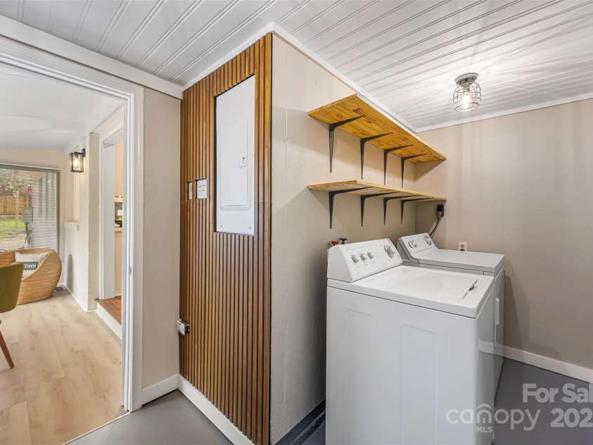 4308 Firwood Lane, Charlotte, NC 28209.  MLS# CAR4309666, YatesRealty ID 41102. Laundry room with shelving