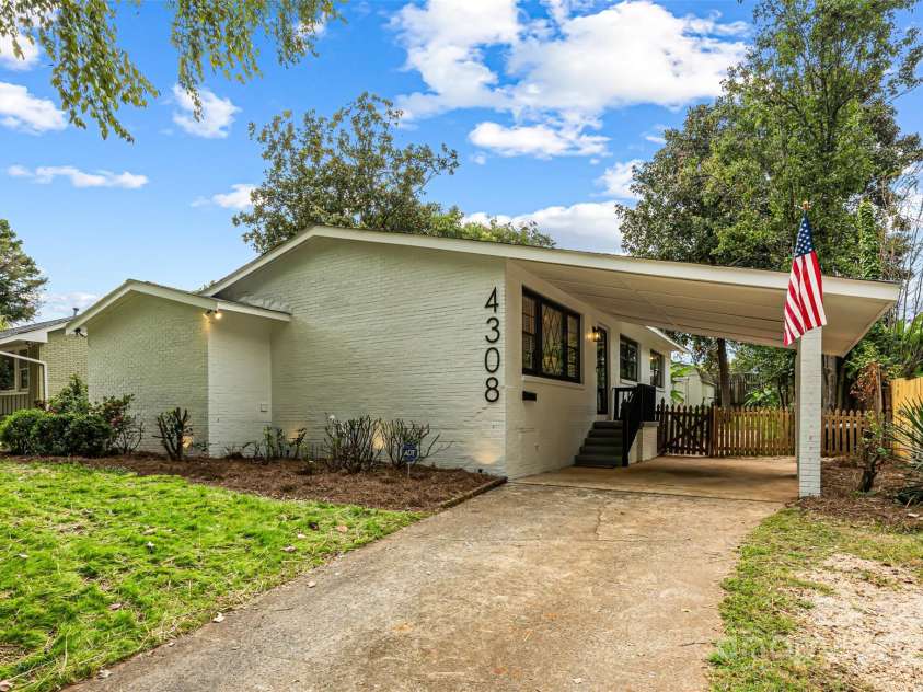 4308 Firwood Lane, Charlotte, NC 28209.  MLS# CAR4309666, YatesRealty ID 41102. Parking space on the right side of the driveway