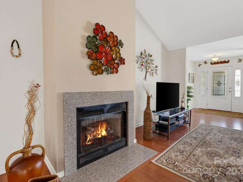 41 Sunview Circle, Arden, NC 28704.  MLS# CAR4235313, YatesRealty ID 4111. Living Room before repainting