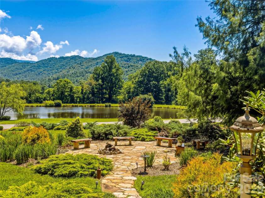 13 Ashley Road, Asheville, NC 28805.  MLS# CAR4407414, YatesRealty ID 41118. Front Patio with beautiful views and fire pit