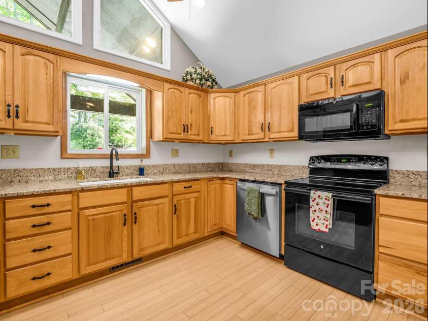 203 Treetops Lane, Lake Lure, NC 28746.  MLS# CAR4406198, YatesRealty ID 41119. 