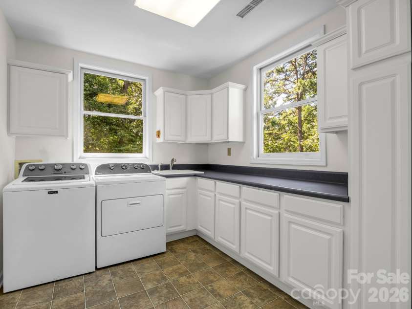 203 Treetops Lane, Lake Lure, NC 28746.  MLS# CAR4406198, YatesRealty ID 41119. 