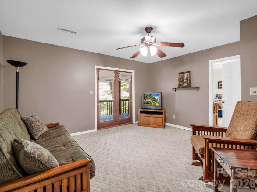 203 Treetops Lane, Lake Lure, NC 28746.  MLS# CAR4406198, YatesRealty ID 41119. 