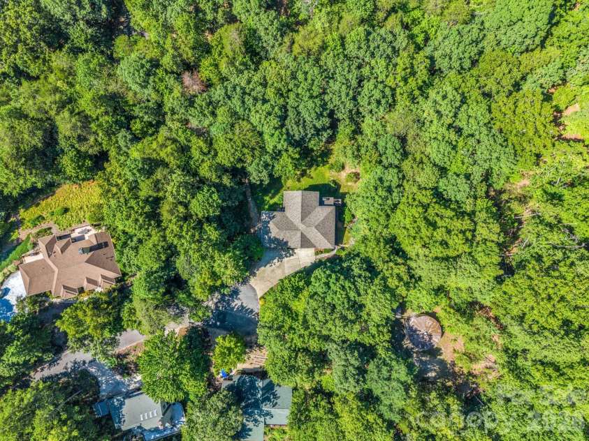 203 Treetops Lane, Lake Lure, NC 28746.  MLS# CAR4406198, YatesRealty ID 41119. 