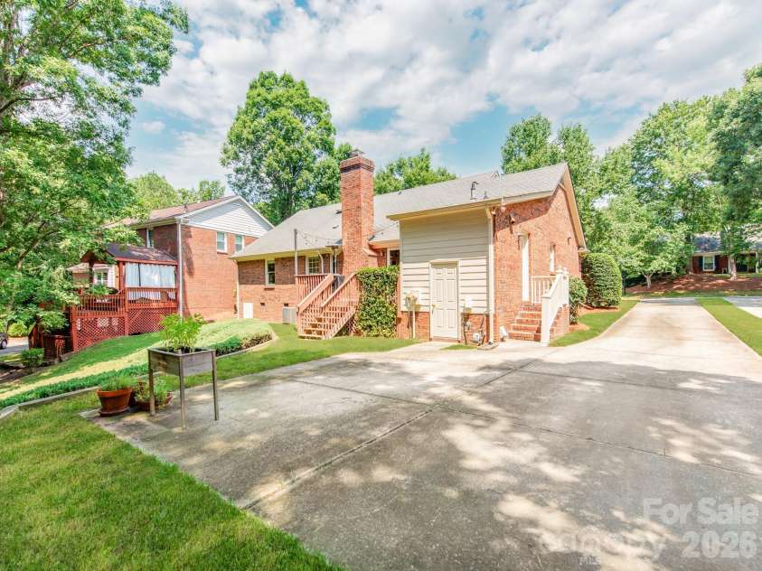 621 Laurel Fork Drive, Matthews, NC 28105.  MLS# CAR4408022, YatesRealty ID 41121. Ample parking and an exterior storage closet