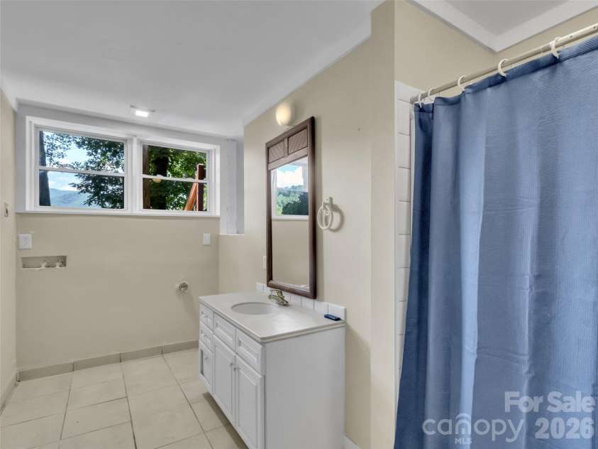 28 Wake Street, Waynesville, NC 28716.  MLS# CAR4402099, YatesRealty ID 41125. Apt #2 Bathroom