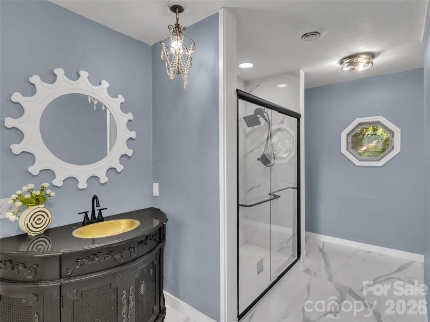 28 Wake Street, Waynesville, NC 28716.  MLS# CAR4402099, YatesRealty ID 41125. Primary Bathroom