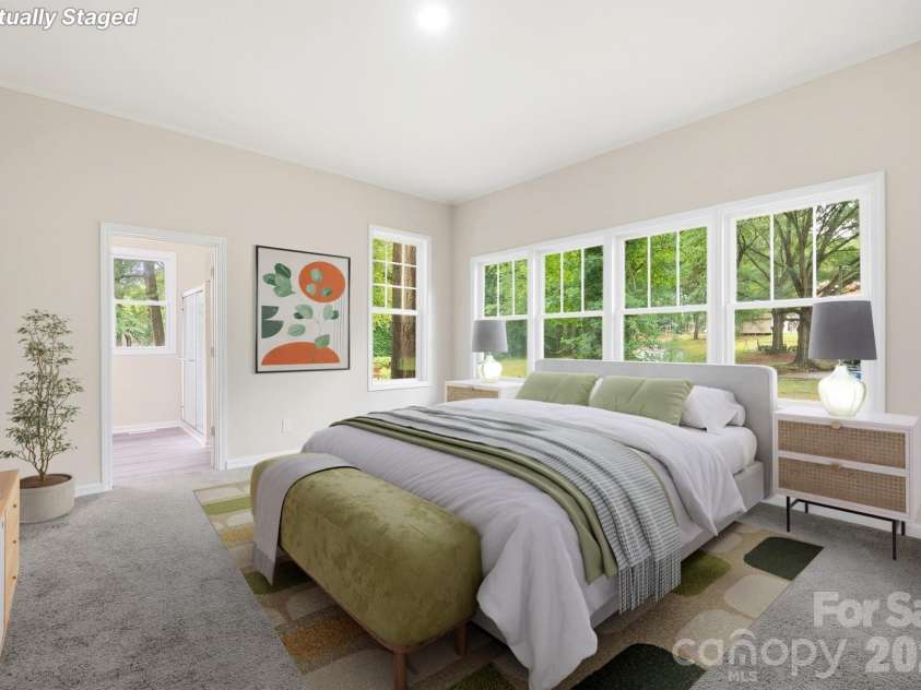 606 Townsend Avenue, Gastonia, NC 28052.  MLS# CAR4396670, YatesRealty ID 41128. Beautiful Primary Suite - Virtually Staged