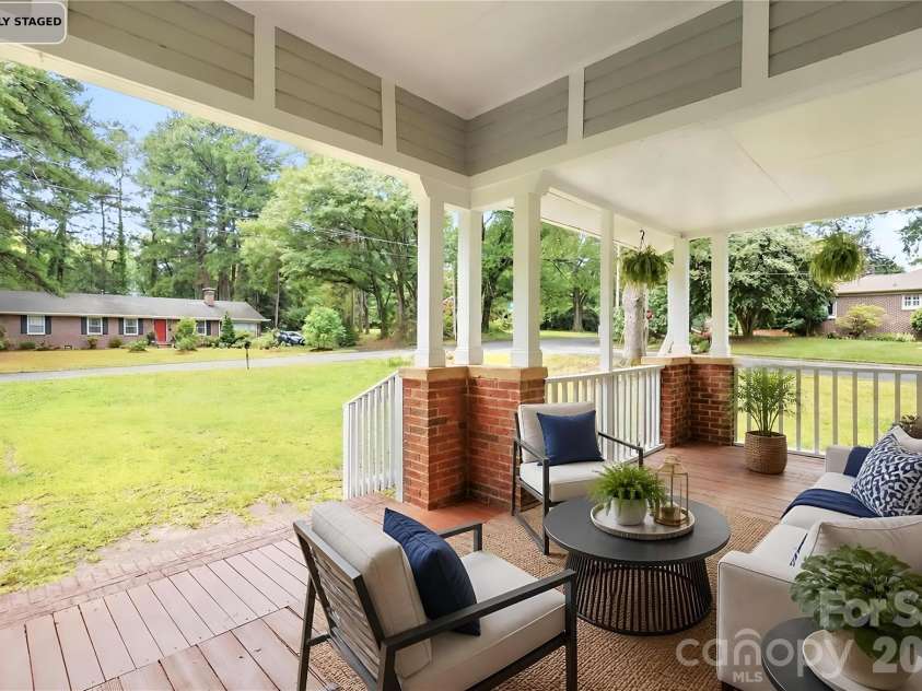 606 Townsend Avenue, Gastonia, NC 28052.  MLS# CAR4396670, YatesRealty ID 41128. Huge Covered Porch - Virtually Staged