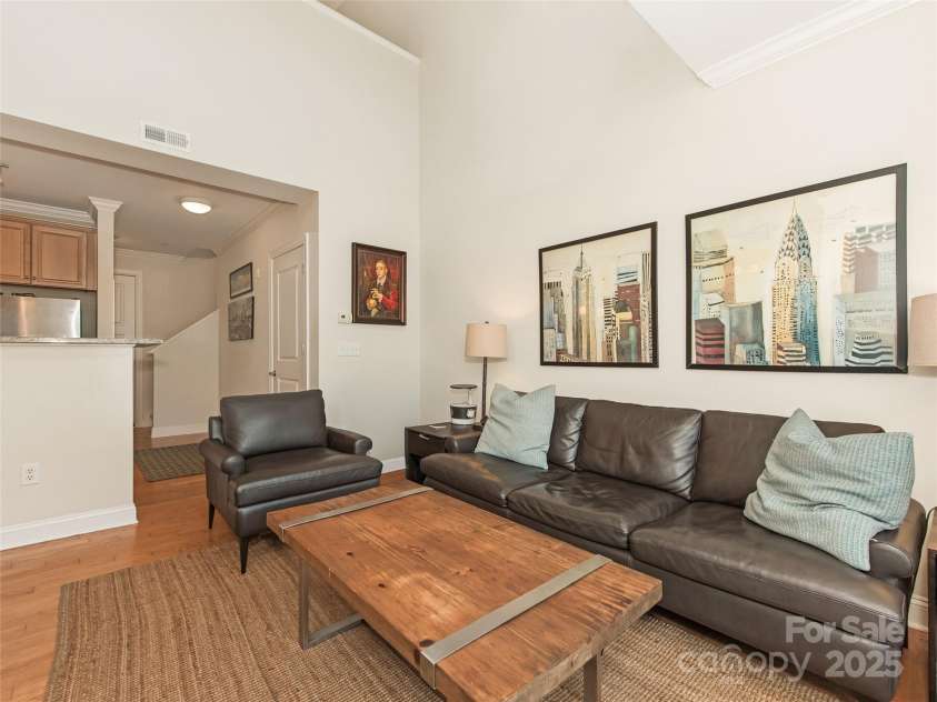 301 Tremont Avenue, Charlotte, NC 28203.  MLS# CAR4240275, YatesRealty ID 4113. Living Room - virtually staged to show layout