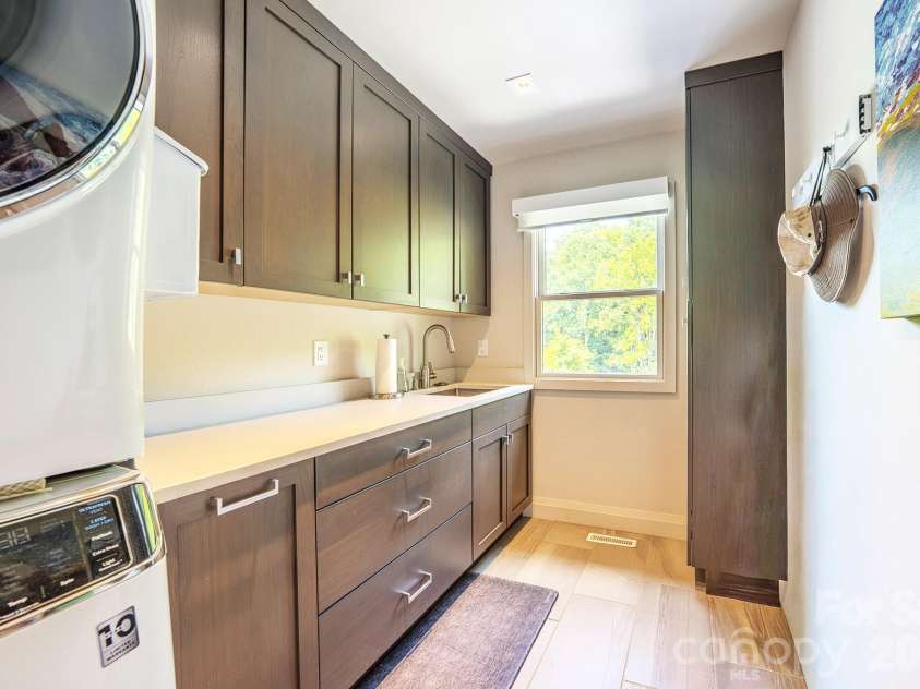 294 Red Knob Lane, Marshall, NC 28753.  MLS# CAR4405147, YatesRealty ID 41131. LAUNDRY ROOM MAIN LEVEL