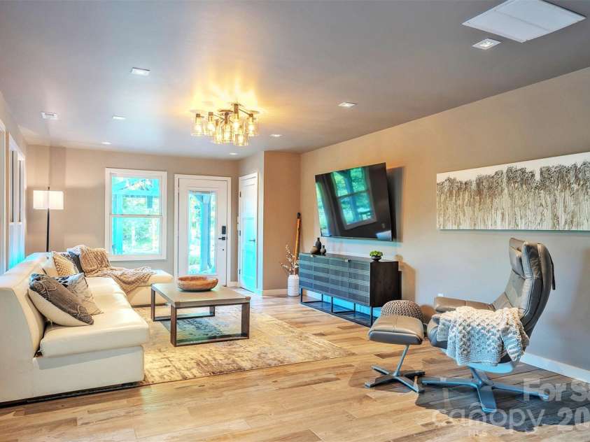 294 Red Knob Lane, Marshall, NC 28753.  MLS# CAR4405147, YatesRealty ID 41131. LOWER LEVEL LIVING ROOM