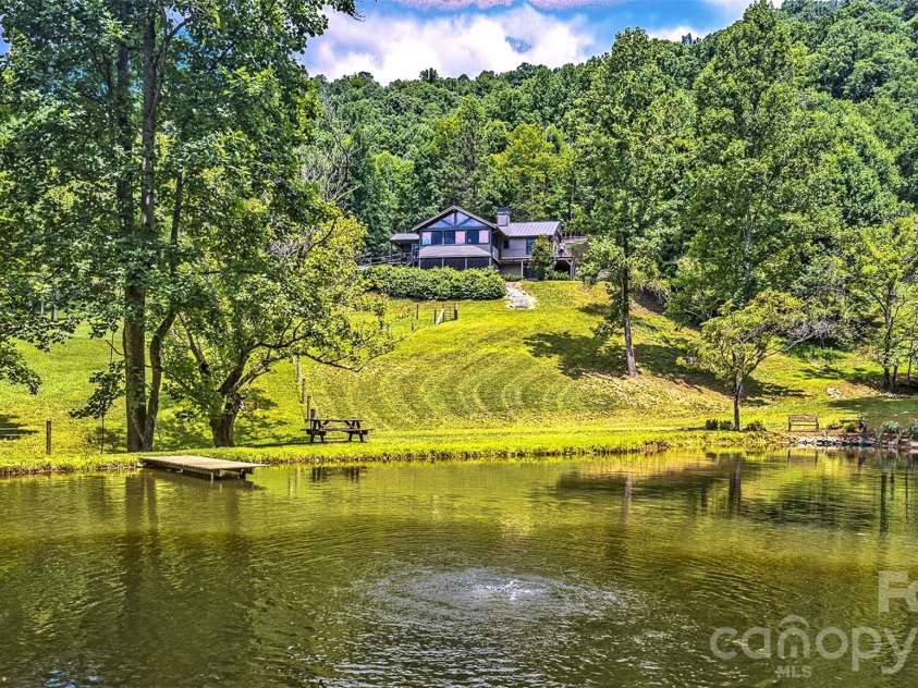 294 Red Knob Lane, Marshall, NC 28753.  MLS# CAR4405147, YatesRealty ID 41131. POND TO HOME VIEW