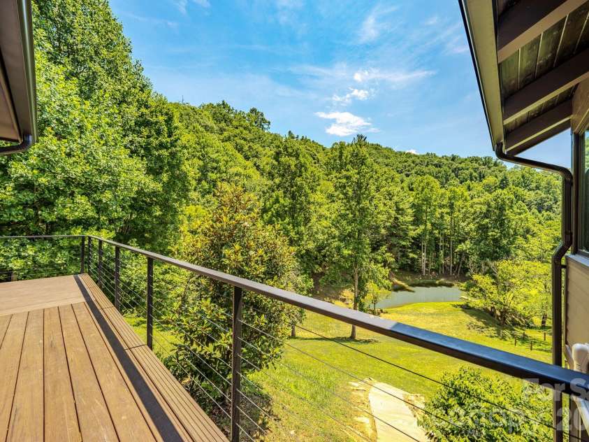 294 Red Knob Lane, Marshall, NC 28753.  MLS# CAR4405147, YatesRealty ID 41131. REAR DECK-POND