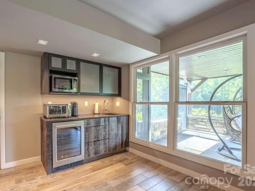 294 Red Knob Lane, Marshall, NC 28753.  MLS# CAR4405147, YatesRealty ID 41131. WET BAR LOWER LEVEL