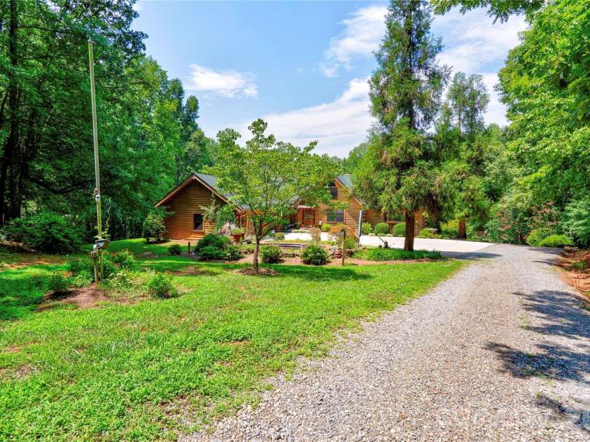495 Shires Road, Ellenboro, NC 28040.  MLS# CAR4409161, YatesRealty ID 41135. Driveway to Front
