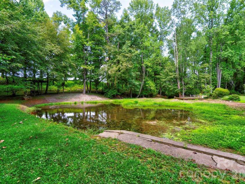 495 Shires Road, Ellenboro, NC 28040.  MLS# CAR4409161, YatesRealty ID 41135. Pond In Back