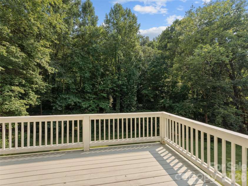 218 Junaluska Oaks Drive, Waynesville, NC 28786.  MLS# CAR4409822, YatesRealty ID 41144. Back Deck Facing Backyard