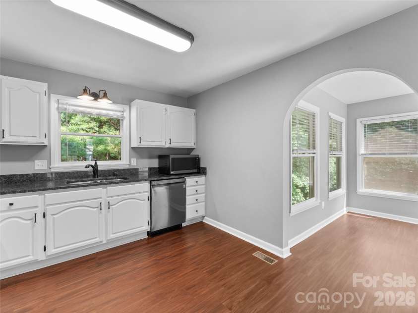 218 Junaluska Oaks Drive, Waynesville, NC 28786.  MLS# CAR4409822, YatesRealty ID 41144. Kitchen facing Dining Room