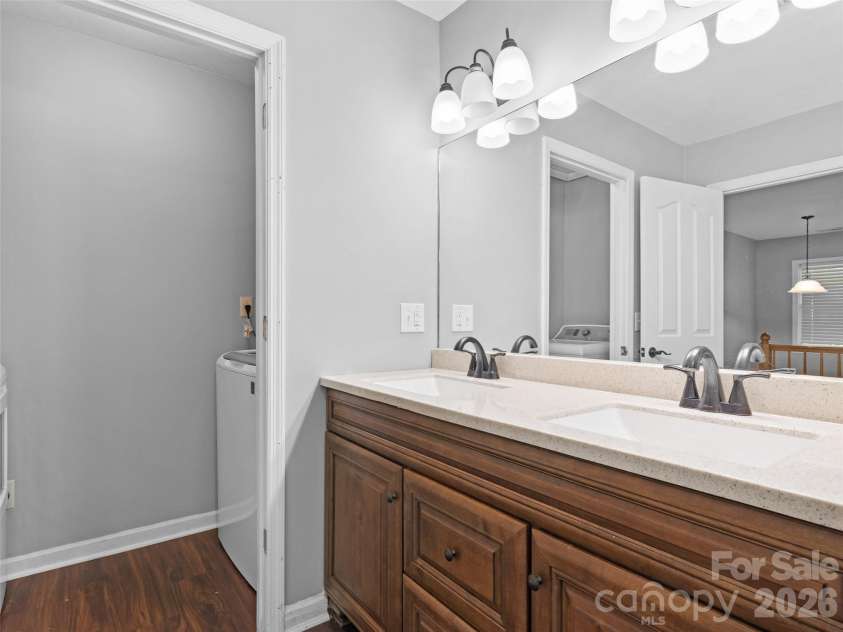 218 Junaluska Oaks Drive, Waynesville, NC 28786.  MLS# CAR4409822, YatesRealty ID 41144. Laundry Room off Full Bath Upper Level