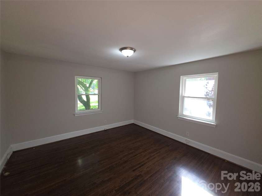 4132 Central Avenue, Charlotte, NC 28205.  MLS# CAR4410443, YatesRealty ID 41148. Front Corner Bedroom