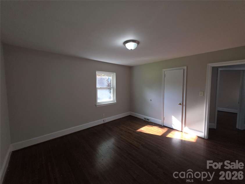 4132 Central Avenue, Charlotte, NC 28205.  MLS# CAR4410443, YatesRealty ID 41148. Front Corner Bedroom