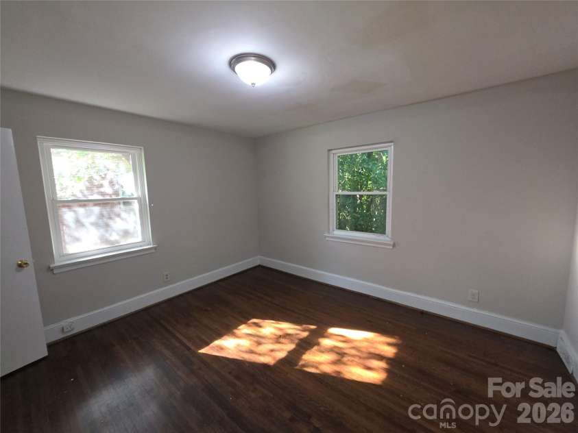 4132 Central Avenue, Charlotte, NC 28205.  MLS# CAR4410443, YatesRealty ID 41148. Rear Corner Bedroom