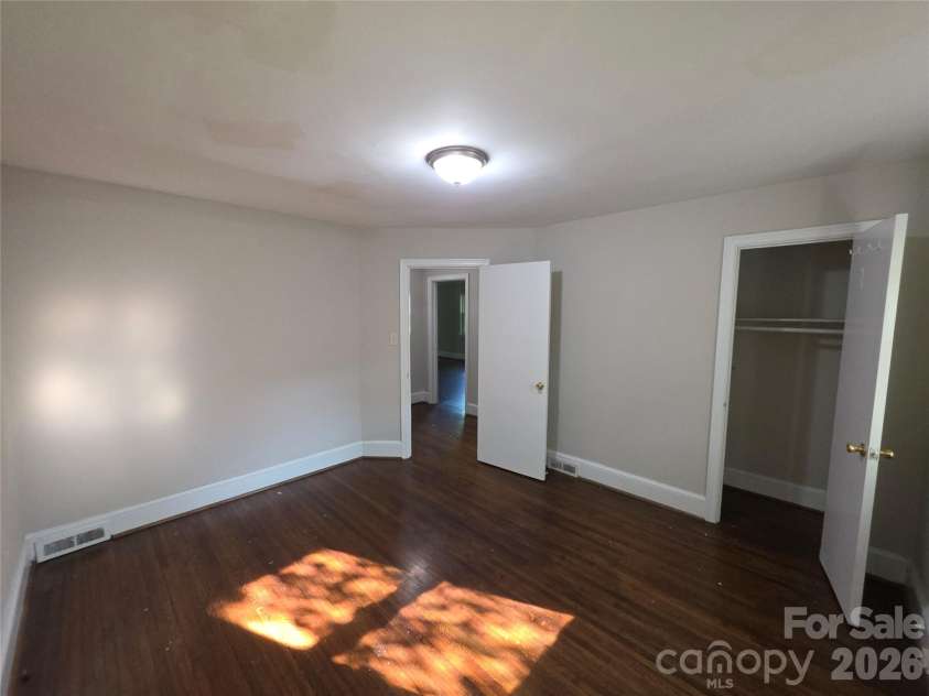 4132 Central Avenue, Charlotte, NC 28205.  MLS# CAR4410443, YatesRealty ID 41148. Rear Corner Bedroom