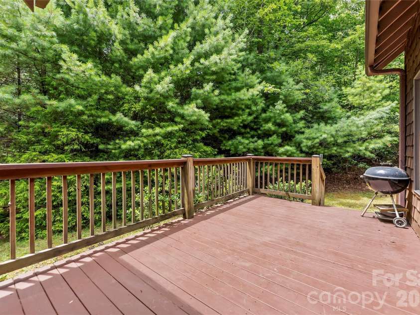 129 Nodatsi Court, Brevard, NC 28712.  MLS# CAR4407587, YatesRealty ID 41149. Also a door to the open deck for grilling