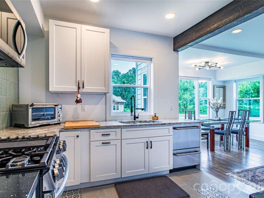 16 Riverside Drive, Barnardsville, NC 28709.  MLS# CAR4396909, YatesRealty ID 41152. 