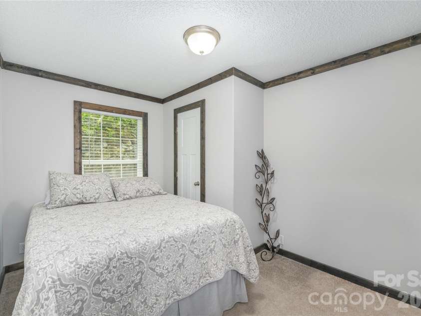 92 Bobcat Road, Maggie Valley, NC 28751.  MLS# CAR4409903, YatesRealty ID 41157. 