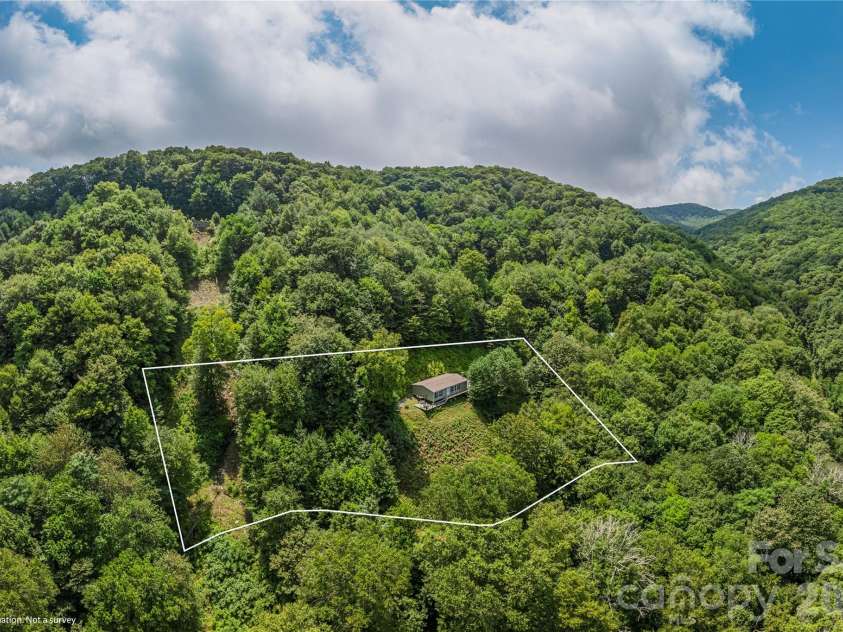 92 Bobcat Road, Maggie Valley, NC 28751.  MLS# CAR4409903, YatesRealty ID 41157. 