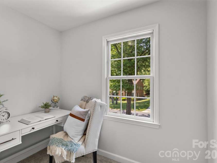 7721 Bradenton Drive, Charlotte, NC 28210.  MLS# CAR4408258, YatesRealty ID 41159. Home Office/Flex Room – Bright office featuring a large window and a functional layout designed for productivity.