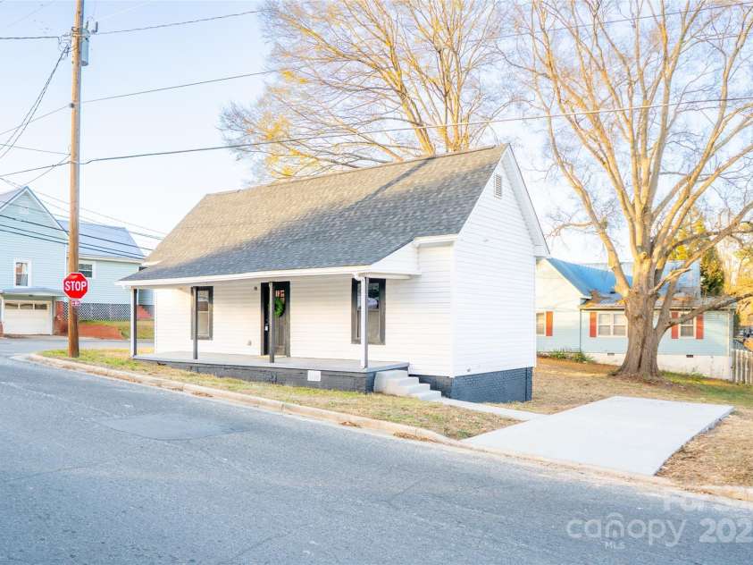 748 Efird Street, Albemarle, NC 28001.  MLS# CAR4330218, YatesRealty ID 4116. Front of House and Driveway