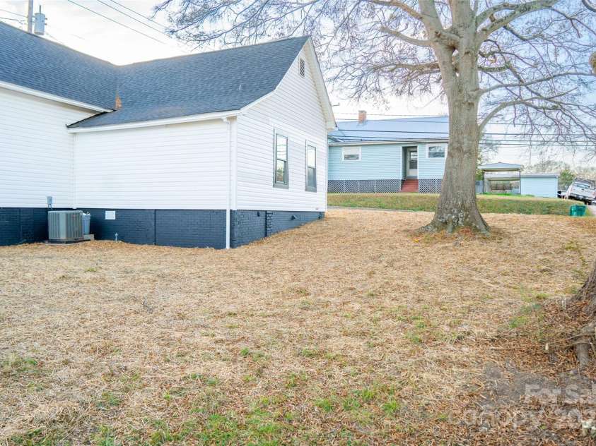 748 Efird Street, Albemarle, NC 28001.  MLS# CAR4330218, YatesRealty ID 4116. View of Back Yard