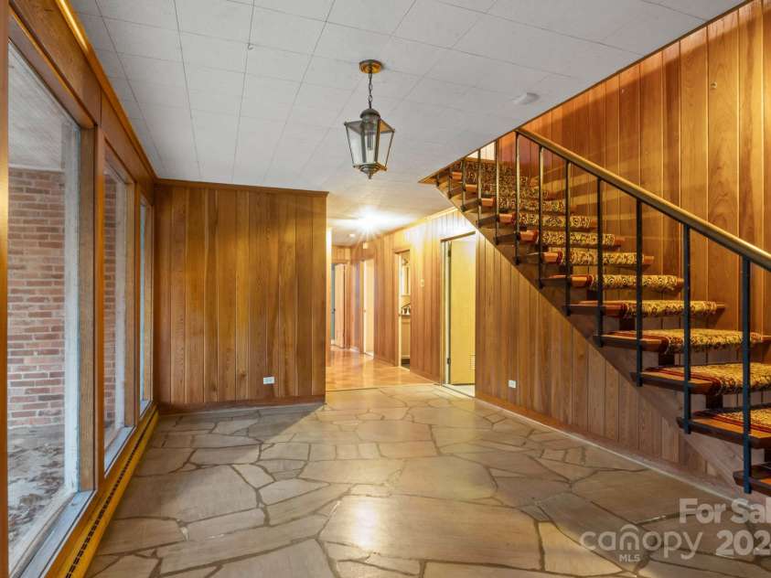 702 Forest Hill Drive, Shelby, NC 28150.  MLS# CAR4185280, YatesRealty ID 4119. On the other side, this area leads to a hallway with two additional bedrooms and a bathroom.