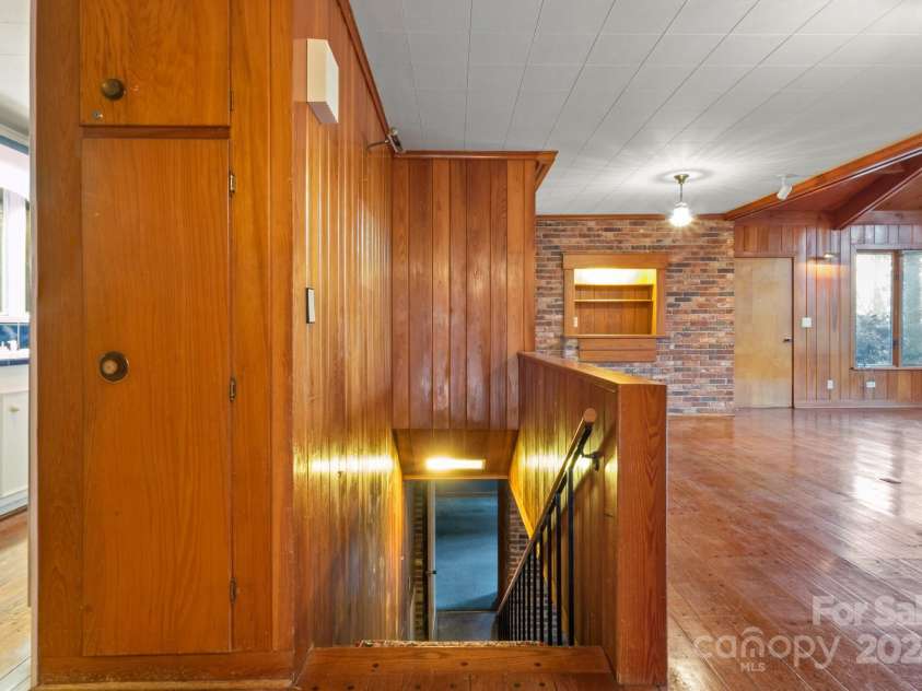 702 Forest Hill Drive, Shelby, NC 28150.  MLS# CAR4185280, YatesRealty ID 4119. There are stairs to the basement off the kitchen and main family room.