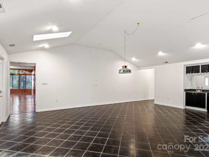 702 Forest Hill Drive, Shelby, NC 28150.  MLS# CAR4185280, YatesRealty ID 4119. There is a wet bar in the large rec room.