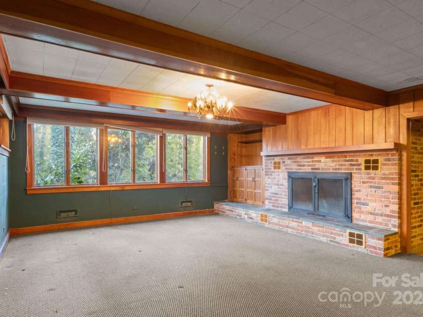 702 Forest Hill Drive, Shelby, NC 28150.  MLS# CAR4185280, YatesRealty ID 4119. There is an additional family room with a cozy fireplace in the basement.